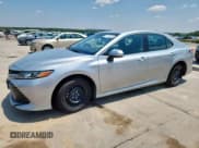 ✅ 2020 Toyota Camry Hybrid LE • VIN: 4T1C31AKXLU018881 • Лот: 64376515. Опубликован ранее на Copart с пробегом 221 603 миль. Бесплатный доступ к архиву аукционных продаж из США и подробный отчёт об истории автомобиля на DreamBid. Изображение 1.