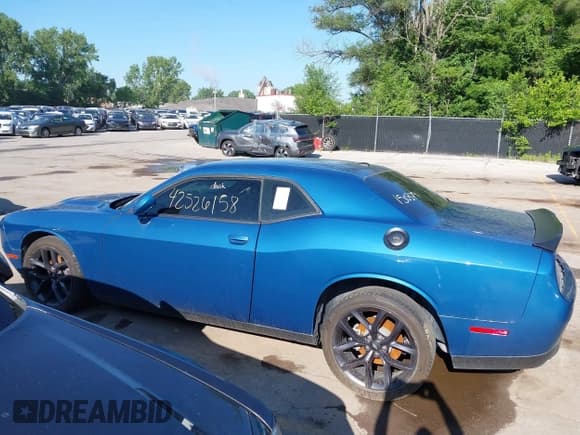 ✅ 2023 Dodge Challenger SXT • VIN: 2C3CDZAG2PH693505 • Lot: 42526158. Listed on IAAI with 28,390 mi. Free auction sales archive from the USA and detailed vehicle history report at DreamBid. Image 14.