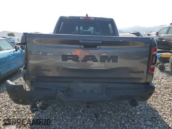 2020 Ram 1500 Rebel z VIN 1C6SRFLM5LN231149, wystawiony jako Copart lot #63299045 z przebiegiem 142 864 mil mil oraz Szkoda całkowita • Salvage title. Historia ofert i sprzedaży dostępna na DreamBid. Obrazek 6.