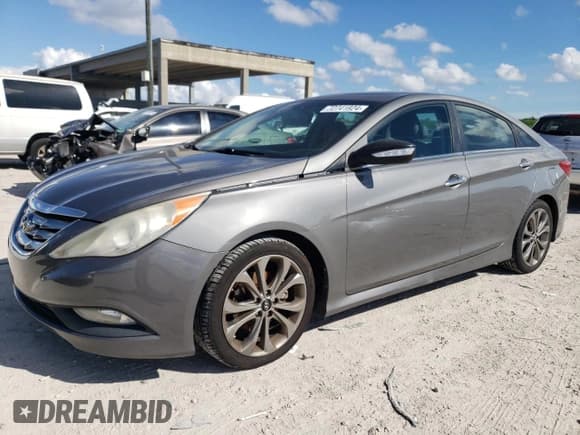 ✅ 2014 Hyundai Sonata Limited • VIN: 5NPEC4AB6EH808805 • Lot: 72741924. Listed on Copart with 142,574 mi. Free auction sales archive from the USA and detailed vehicle history report at DreamBid. Image 1.