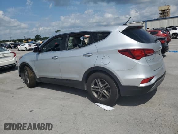 ✅ 2018 Hyundai Santa Fe 2.4L • VIN: 5XYZT3LB9JG545770 • Лот: 57638114. Опубликован ранее на Copart с пробегом Не указан. Бесплатный доступ к архиву аукционных продаж из США и подробный отчёт об истории автомобиля на DreamBid. Изображение 2.