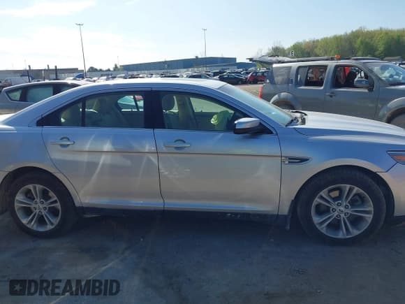 ✅ 2016 Ford Taurus SEL • VIN: 1FAHP2H89GG122786 • Lot: 42259021. Listed on IAAI with 43,154 mi. Free auction sales archive from the USA and detailed vehicle history report at DreamBid. Image 13.
