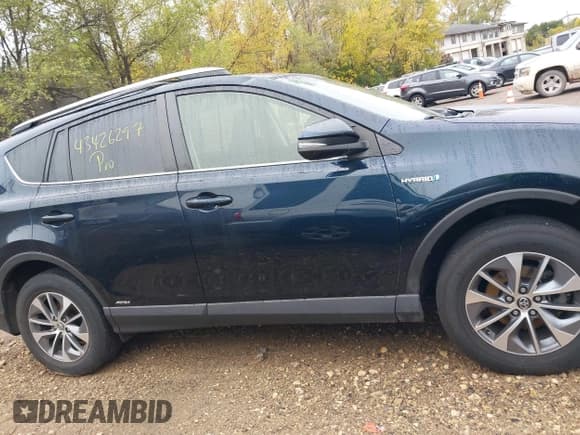 ✅ 2018 Toyota RAV4 Hybrid XLE • VIN: JTMRJREV0JD241600 • Lot: 43426297. Listed on IAAI with 63,794 mi. Free auction sales archive from the USA and detailed vehicle history report at DreamBid. Image 13.