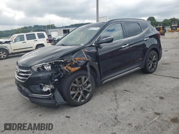 ✅ 2017 Hyundai Santa Fe Ultimate • VIN: 5XYZWDLA5HG497652 • Лот: 68121214. Опубликован ранее на Copart с пробегом 85 621 миль. Бесплатный доступ к архиву аукционных продаж из США и подробный отчёт об истории автомобиля на DreamBid. Изображение 1.