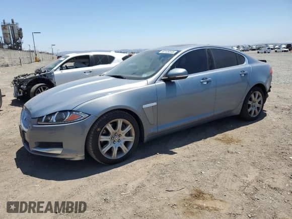 ✅ 2013 Jaguar XF RWD • VIN: SAJWA0E77D8S91277 • Lot: 63109595. Listed on Copart with 81,735 mi. Free auction sales archive from the USA and detailed vehicle history report at DreamBid. Image 1.