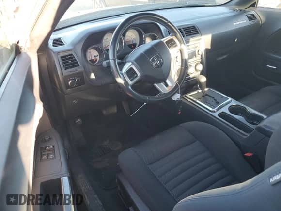 2012 Dodge Challenger SXT z VIN 2C3CDYAG5CH158155, wystawiony jako Copart lot #71998244 z przebiegiem 63 416 mil mil oraz Szkoda całkowita • Salvage title. Historia ofert i sprzedaży dostępna na DreamBid. Obrazek 8.