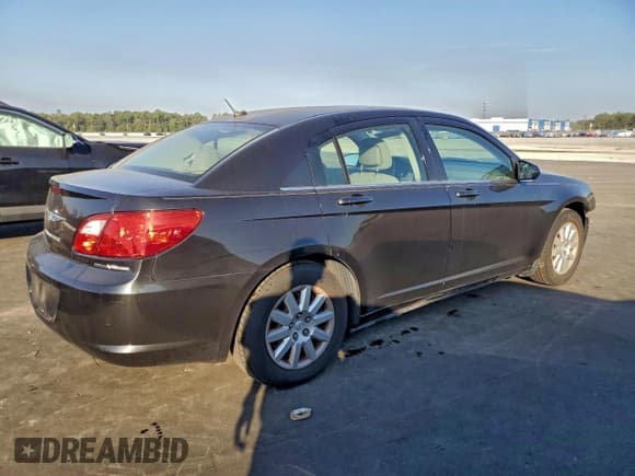 ✅ 2010 Chrysler Sebring Touring • VIN: 1C3CC4FB2AN195337 • Lot: 93695125. Listed on Copart with 161,890 mi. Free auction sales archive from the USA and detailed vehicle history report at DreamBid. Image 3.