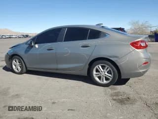 ✅ 2017 Chevrolet Cruze LT • VIN: 1G1BE5SM2H7210036 • Lot: 90130525. Listed on Copart with 66,230 mi. Free auction sales archive from the USA and detailed vehicle history report at DreamBid. Image 2.
