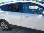 ✅ 2015 Ford Escape Titanium • VIN: 1FMCU0J91FUA50191 • Lot: 42219288. Listed on IAAI with 159,886 mi. Free auction sales archive from the USA and detailed vehicle history report at DreamBid. Image 13.