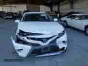 2020 Toyota Camry Hybrid SE с VIN 4T1G31AK3LU542830, выставлен на аукционе Copart как лот 84293245 с пробегом Не указан миль и Списание • Salvage title. История ставок и продаж доступна на DreamBid. Изображение 5.