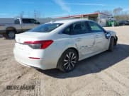 ✅ 2022 Honda Civic EX • VIN: JHMFE1F7XNX002986 • Lot: 41705193. Listed on IAAI with 61,718 mi. Free auction sales archive from the USA and detailed vehicle history report at DreamBid. Image 4.