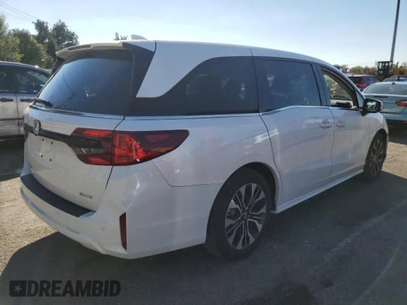 ✅ 2025 Honda Odyssey Elite • VIN: 5FNRL6H93SB019974 • Лот: 86479515. Опубликован ранее на Copart с пробегом 8 069 миль. Бесплатный доступ к архиву аукционных продаж из США и подробный отчёт об истории автомобиля на DreamBid. Изображение 3.