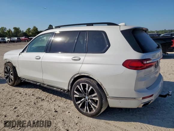 ✅ 2021 BMW X7 xDrive40i • VIN: 5UXCW2C06M9F17440 • Лот: 86444215. Опубликован ранее на Copart с пробегом 75 427 миль. Бесплатный доступ к архиву аукционных продаж из США и подробный отчёт об истории автомобиля на DreamBid. Изображение 2.
