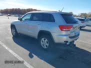 ✅ 2013 Jeep Grand Cherokee Laredo • VIN: 1C4RJFAG8DC607593 • Lot: 43643452. Listed on IAAI with 168,356 mi. Free auction sales archive from the USA and detailed vehicle history report at DreamBid. Image 3.