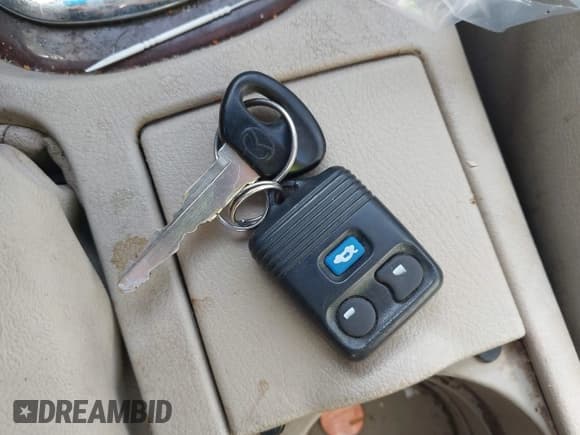 ✅ 2000 Mazda 626 LX • VIN: 1YVGF22C0Y5105162 • Lot: 43667485. Listed on IAAI with 75,410 mi. Free auction sales archive from the USA and detailed vehicle history report at DreamBid. Image 11.