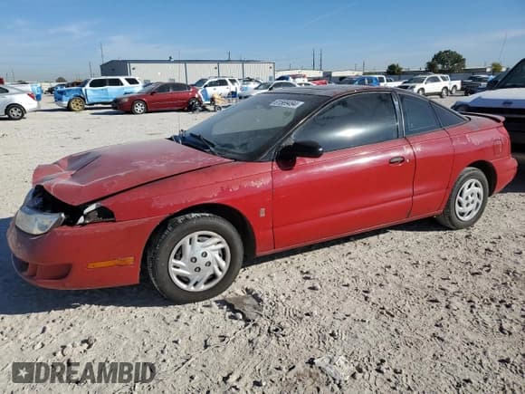 ✅ 2000 Saturn SC • VIN: 1G8ZN1284YZ118197 • Лот: 81569494. Опубликован ранее на Copart с пробегом 254 011 миль. Бесплатный доступ к архиву аукционных продаж из США и подробный отчёт об истории автомобиля на DreamBid. Изображение 1.