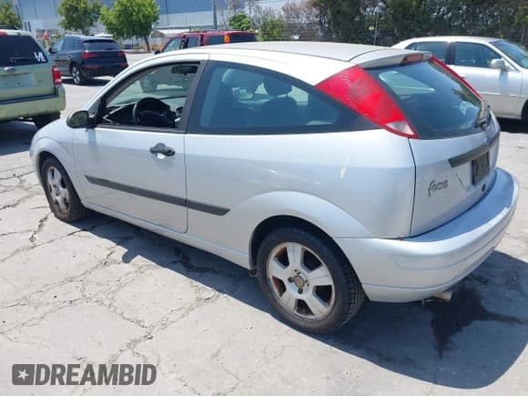 ✅ 2003 Ford Focus ZX3 • VIN: 3FAFP31Z03R173760 • Lot: 42458510. Listed on IAAI with 147,663 mi. Free auction sales archive from the USA and detailed vehicle history report at DreamBid. Image 3.