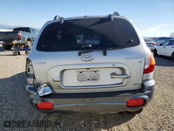 2002 Hyundai Santa Fe GLS z VIN KM8SC73D92U182330, wystawiony jako Copart lot #41827535 z przebiegiem 177 157 mil mil oraz Szkoda całkowita • Salvage title. Historia ofert i sprzedaży dostępna na DreamBid. Obrazek 6.