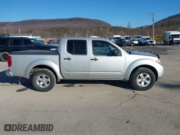 ✅ 2013 Nissan Frontier SL • VIN: 1N6AD0EV0DN731594 • Lot: 41702767. Listed on IAAI with 101,611 mi. Free auction sales archive from the USA and detailed vehicle history report at DreamBid. Image 13.