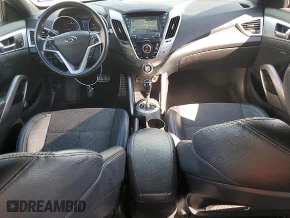 ✅ 2016 Hyundai Veloster • VIN: KMHTC6AD4GU299242 • Lot: 75996484. Wystawiony na Copart z przebiegiem 83 644 mil. Bezpłatny archiwum sprzedaży aukcyjnych z USA i szczegółowy raport historii pojazdu na DreamBid. Zdjęcie 8.