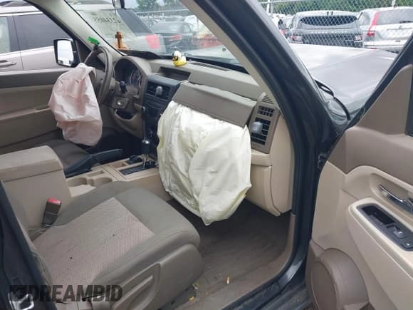 ✅ 2011 Jeep Liberty Sport Jet • VIN: 1J4PN2GK2BW577190 • Lot: 42334055. Listed on IAAI with 178,065 mi. Free auction sales archive from the USA and detailed vehicle history report at DreamBid. Image 5.