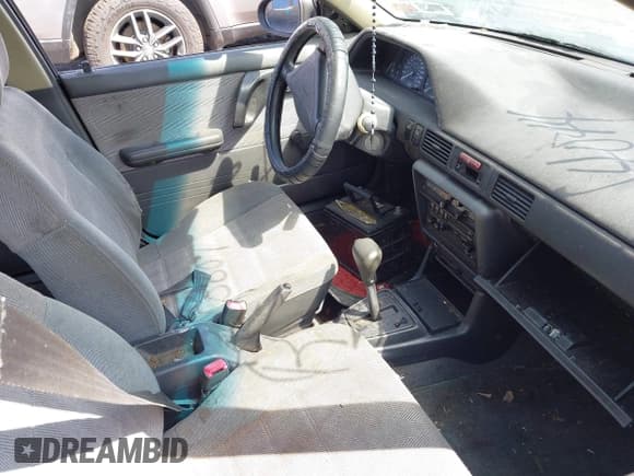 ✅ 1994 Mazda Protege DX • VIN: JM1BG2249R0774647 • Lot: 42093689. Wystawiony na IAAI z przebiegiem 89 376 mil. Bezpłatny archiwum sprzedaży aukcyjnych z USA i szczegółowy raport historii pojazdu na DreamBid. Zdjęcie 5.