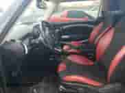 2011 MINI Hardtop S with VIN WMWSV3C53BTY15603, listed as a Copart auction lot 54893395 with 104,206 mi miles and Salvage title. Bid and sale history available at DreamBid. Image 7.