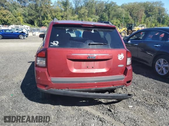 ✅ 2014 Jeep Compass Latitude • VIN: 1C4NJCEB3ED582593 • Lot: 86065515. Listed on Copart with 70,124 mi. Free auction sales archive from the USA and detailed vehicle history report at DreamBid. Image 6.