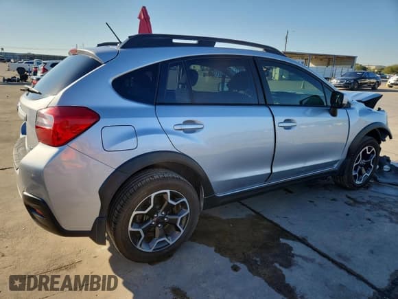 ✅ 2014 Subaru Crosstrek Premium • VIN: JF2GPAWC1E8276960 • Lot: 87272855. Listed on Copart with 82,335 mi. Free auction sales archive from the USA and detailed vehicle history report at DreamBid. Image 3.
