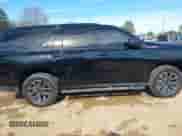 2022 Chevrolet Tahoe Z71 z VIN 1GNSKPKD1NR185780, wystawiony jako IAAI lot #41301544 z przebiegiem 54 359 mil mil oraz . Historia ofert i sprzedaży dostępna na DreamBid. Obrazek 13.