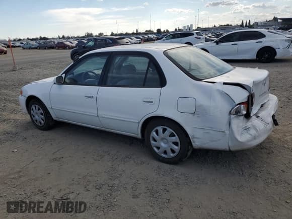 ✅ 2001 Toyota Corolla CE • VIN: 1NXBR12E71Z517721 • Lot: 80364505. Listed on Copart with 81,616 mi. Free auction sales archive from the USA and detailed vehicle history report at DreamBid. Image 2.