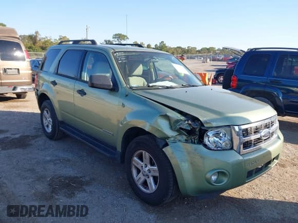 ✅ 2008 Ford Escape Hybrid • VIN: 1FMCU49H48KC13384 • Lot: 43716716. Wystawiony na IAAI z przebiegiem 128 236 mil. Bezpłatny archiwum sprzedaży aukcyjnych z USA i szczegółowy raport historii pojazdu na DreamBid. Zdjęcie 1.