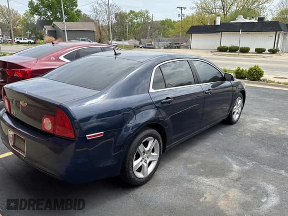 ✅ 2010 Chevrolet Malibu 1LS • VIN: 1G1ZB5EB6AF196056 • Lot: 53687215. Listed on Copart with 130,835 mi. Free auction sales archive from the USA and detailed vehicle history report at DreamBid. Image 4.