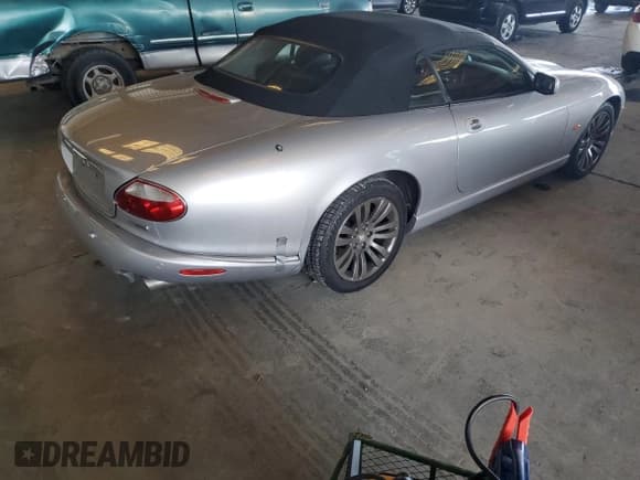 ✅ 2005 Jaguar XK XK8 • VIN: SAJDA42C752A41240 • Лот: 85357775. Опубликован ранее на Copart с пробегом 131 928 миль. Бесплатный доступ к архиву аукционных продаж из США и подробный отчёт об истории автомобиля на DreamBid. Изображение 3.
