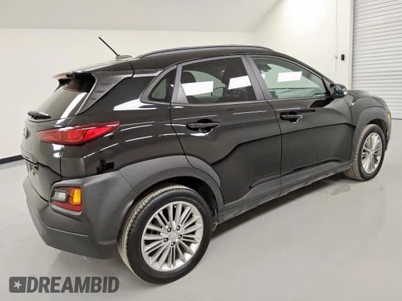 ✅ 2021 Hyundai Kona SEL • VIN: KM8K22AAXMU737304 • Лот: 63745555. Опубликован ранее на Copart с пробегом 76 653 миль. Бесплатный доступ к архиву аукционных продаж из США и подробный отчёт об истории автомобиля на DreamBid. Изображение 3.