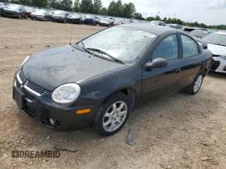 2004 Dodge Neon SXT with VIN 1B3ES56CX4D644832, listed as a Copart auction lot 62601334 with 165,493 mi miles and Salvage title. Bid and sale history available at DreamBid. Image 1.