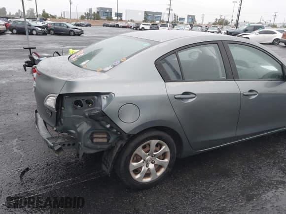 ✅ 2012 Mazda 3 i Sport • VIN: JM1BL1UG4C1615193 • Lot: 42192220. Listed on IAAI with 206,453 mi. Free auction sales archive from the USA and detailed vehicle history report at DreamBid. Image 4.