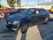 ✅ 2023 Mazda CX-30 S Preferred • VIN: 3MVDMBCM1PM571406 • Lot: 93338865. Listed on Copart with 32,664 mi. Free auction sales archive from the USA and detailed vehicle history report at DreamBid. Image 1.