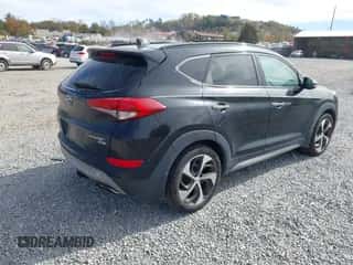 2017 Hyundai Tucson Sport with VIN KM8J3CA26HU355784, listed as a IAAI auction lot 43545974 with 106,884 mi miles and . Bid and sale history available at DreamBid. Image 4.