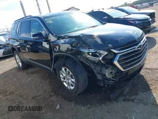 2019 Chevrolet Traverse LT Cloth z VIN 1GNEVGKW5KJ320615, wystawiony jako IAAI lot #43224267 z przebiegiem 101 061 mil mil oraz . Historia ofert i sprzedaży dostępna na DreamBid. Obrazek 1.