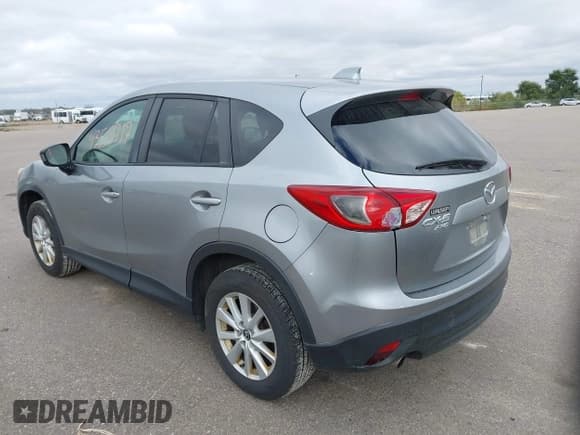 ✅ 2014 Mazda CX-5 Touring • VIN: JM3KE4CY4E0380252 • Lot: 43510717. Wystawiony na IAAI z przebiegiem 207 051 mil. Bezpłatny archiwum sprzedaży aukcyjnych z USA i szczegółowy raport historii pojazdu na DreamBid. Zdjęcie 3.