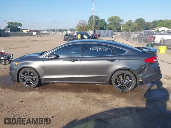 ✅ 2018 Ford Fusion Sport • VIN: 3FA6P0VP8JR195963 • Lot: 43299530. Listed on IAAI with 153,347 mi. Free auction sales archive from the USA and detailed vehicle history report at DreamBid. Image 14.