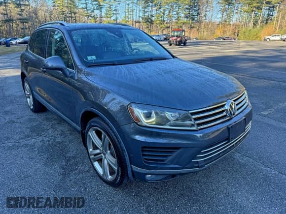 ✅ 2016 Volkswagen Touareg Lux • VIN: WVGEF9BP3GD005114 • Лот: 95557415. Опубликован ранее на Copart с пробегом 165 392 миль. Бесплатный доступ к архиву аукционных продаж из США и подробный отчёт об истории автомобиля на DreamBid. Изображение 1.