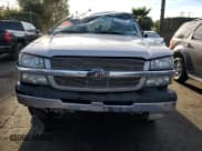 ✅ 2004 Chevrolet Silverado 1500 LS • VIN: 2GCEC19TX41219204 • Lot: 91649455. Wystawiony na Copart z przebiegiem 239 719 mil. Bezpłatny archiwum sprzedaży aukcyjnych z USA i szczegółowy raport historii pojazdu na DreamBid. Zdjęcie 5.