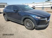 ✅ 2022 Mazda CX-30 S • VIN: 3MVDMBAL5NM423332 • Lot: 52527035. Listed on Copart with 25,609 mi. Free auction sales archive from the USA and detailed vehicle history report at DreamBid. Image 4.