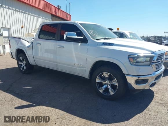 ✅ 2019 Ram 1500 Laramie • VIN: 1C6SRFJT9KN593400 • Lot: 43159850. Listed on IAAI with 86,077 mi. Free auction sales archive from the USA and detailed vehicle history report at DreamBid. Image 1.