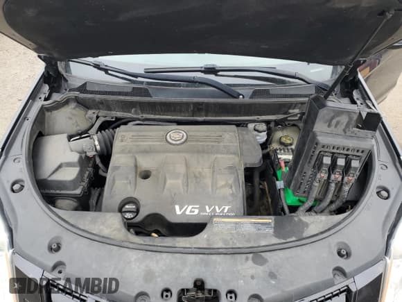 ✅ 2013 Cadillac SRX Performance Collection • VIN: 3GYFNHE37DS590591 • Lot: 47113005. Listed on Copart with 150,202 mi. Free auction sales archive from the USA and detailed vehicle history report at DreamBid. Image 12.