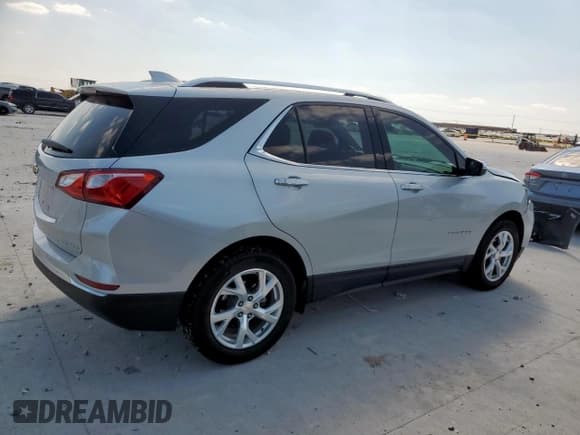 ✅ 2020 Chevrolet Equinox Premier • VIN: 2GNAXNEV4L6163187 • Lot: 81802995. Wystawiony na Copart z przebiegiem 57 892 mil. Bezpłatny archiwum sprzedaży aukcyjnych z USA i szczegółowy raport historii pojazdu na DreamBid. Zdjęcie 3.