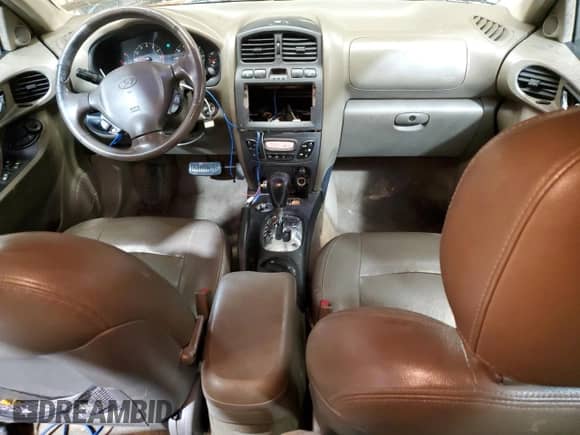 2004 Hyundai Santa Fe GLS z VIN KM8SC73E74U597688, wystawiony jako Copart lot #44570985 z przebiegiem 213 584 mil mil oraz Szkoda całkowita • Salvage title. Historia ofert i sprzedaży dostępna na DreamBid. Obrazek 8.