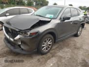 ✅ 2023 Mazda CX-5 S Preferred • VIN: JM3KFBCM3P0230215 • Lot: 43568007. Listed on IAAI with 42,607 mi. Free auction sales archive from the USA and detailed vehicle history report at DreamBid. Image 17.